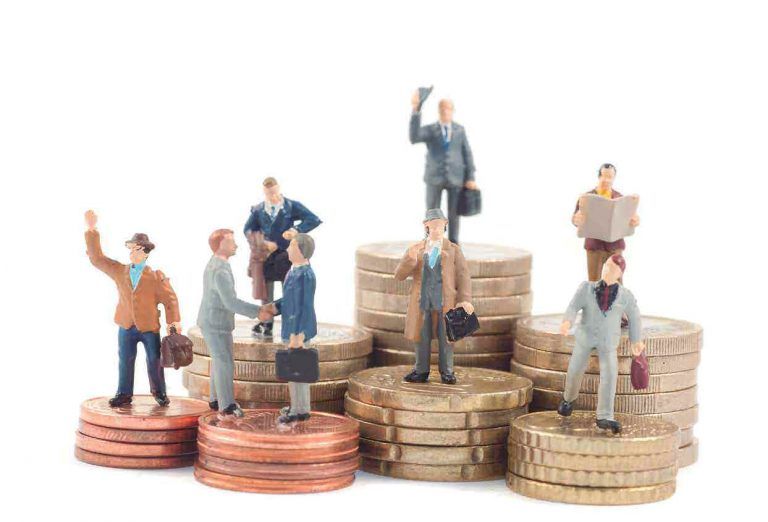 CÓMO SE DETERMINA LA BASE DE LA PARTICIPACIÓN A LOS TRABAJADORES EN LAS UTILIDADES?